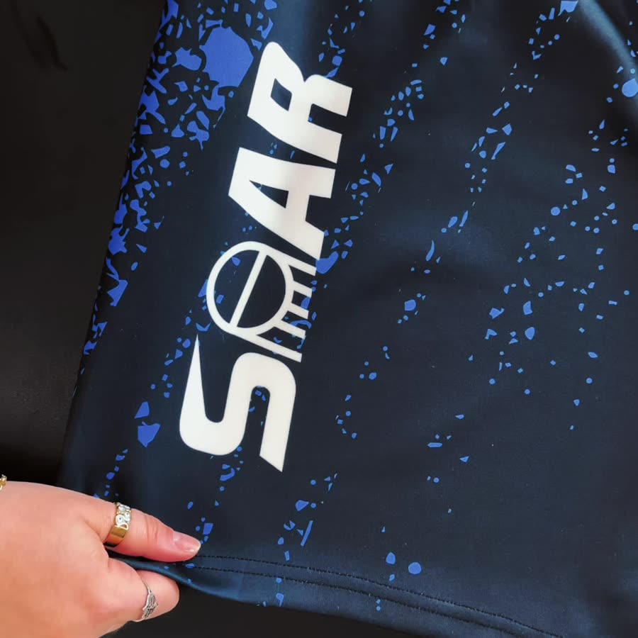 SOAR performance shorts fabric stretched to show two-way give